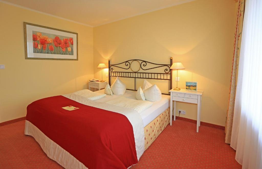 Hotel Duenenburg Westerland Rum bild